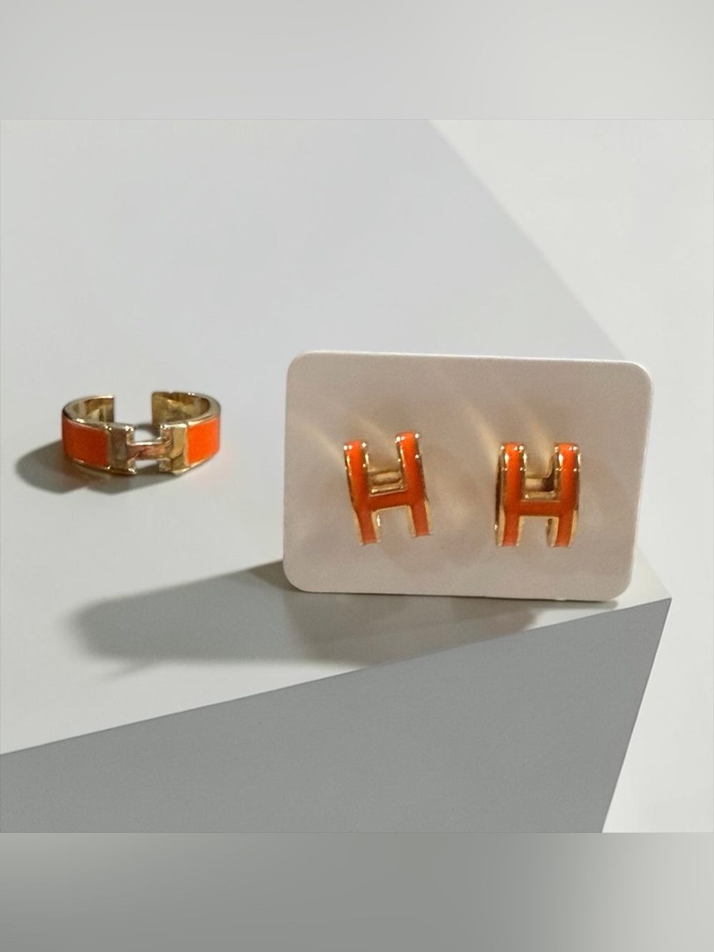 Gold-Tone Orange 'H' Stud Earrings and matching Adjustable Ring | Set